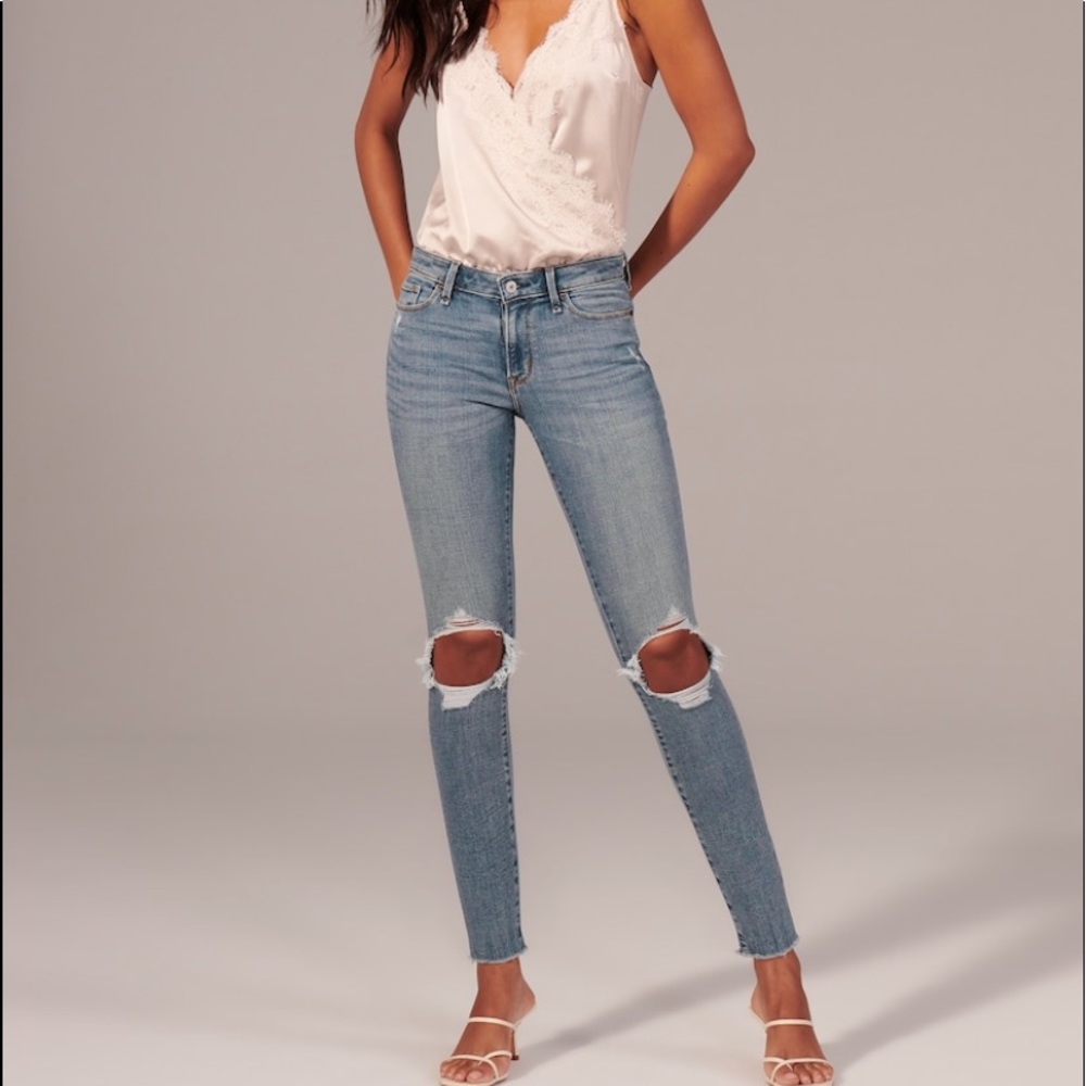 Ripped Mid Rise Super Skinny Ripped Knee Jeans